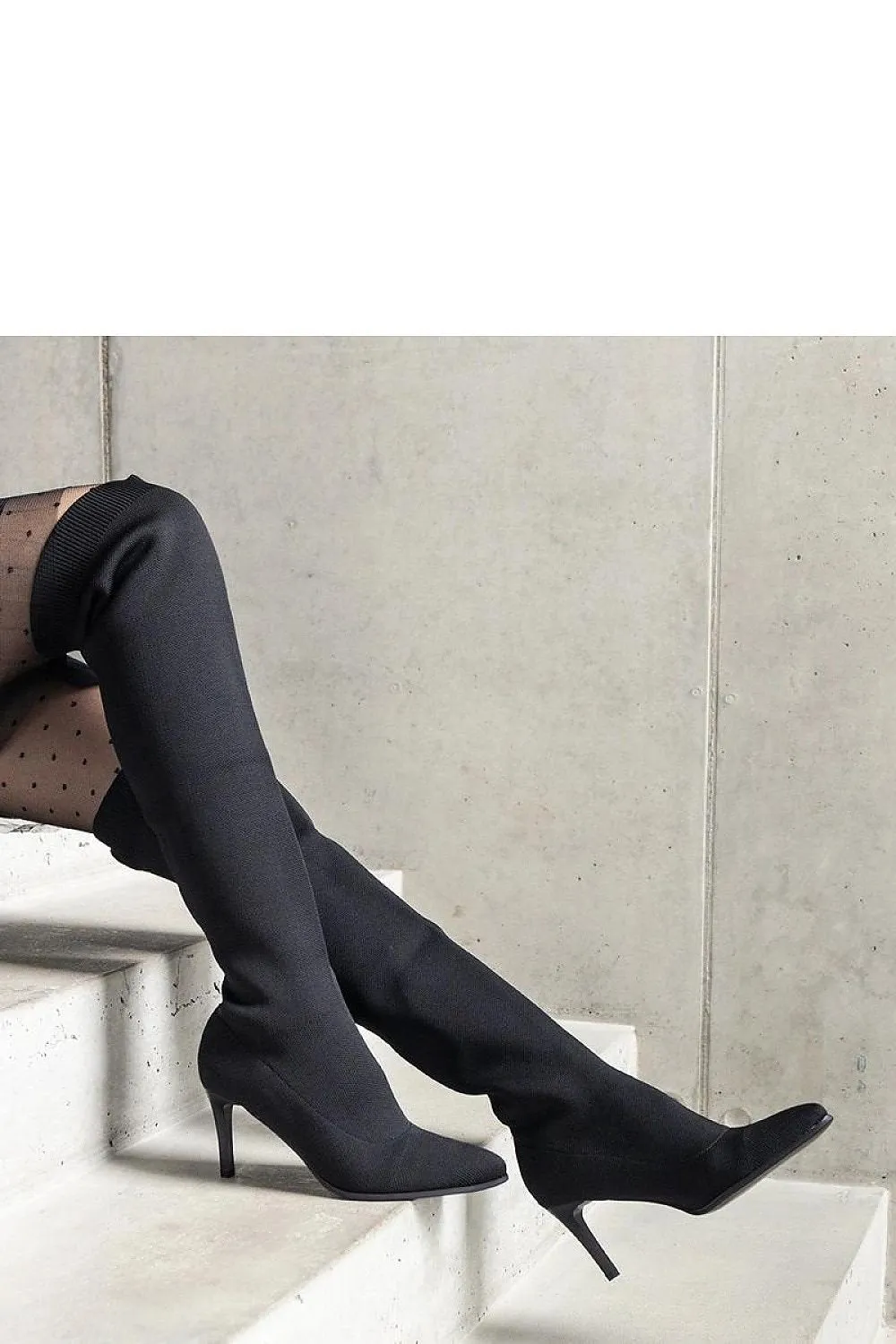 Green stiletto heeled boots